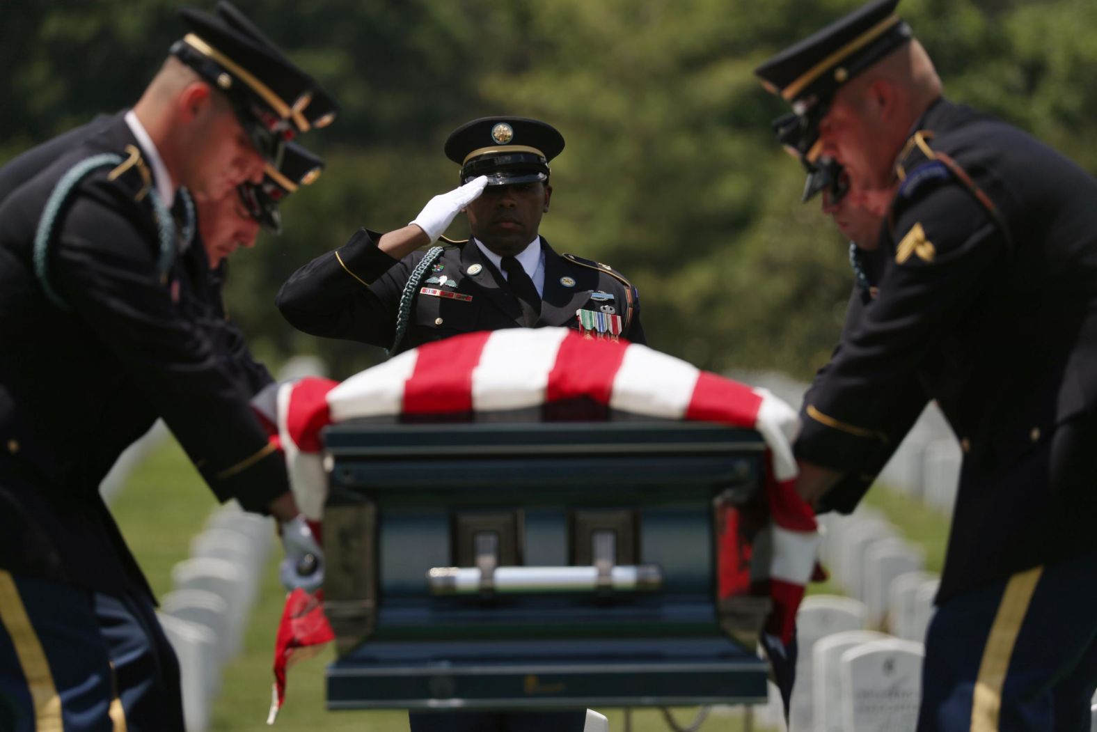 US World War II veteran Carl Mann, from Indiana, is buried at Arlington National Cemetery on the 75th anniversary of the D-Day invasion in Arlington, Virginia US. Mr. Mann, who died at the age of 96, was among the Allied troops who stormed Omaha Beach in Nazi-occupied northern France.