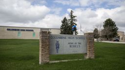 Police(R) patrol outside Columbine High School on April 17, 2019 in Littleton, Colorado, as all Denver-area schools were evacuated and classes cancelled after an active threat to the area made by Sol Pais. - A US teenager has been found dead after a massive search by authorities who feared she posed a threat because of an obsession with the Columbine High School massacre, US media reported. Sol Pais, 18, had traveled on Monday from Miami to Denver where she bought a pump-action shotgun and ammunition before disappearing in the foothills around the city.US media reported police found her body at the base of Mount Evans, near Denver."There is no longer a threat to the community," the FBI's Denver office said on its Twitter account. (Photo by Chet Strange / AFP)        (Photo credit should read CHET STRANGE/AFP/Getty Images)