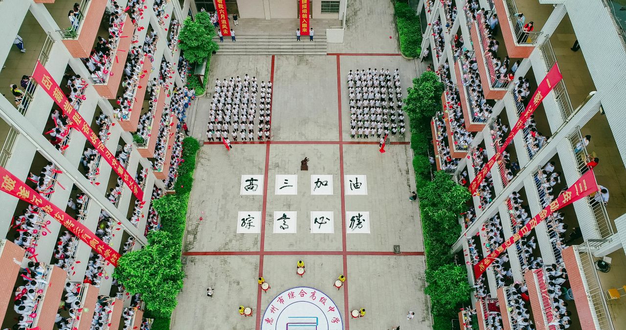 High school students in Huizhou shout words of encouragement on June 5, 2019, ahead of the college entrance exam.