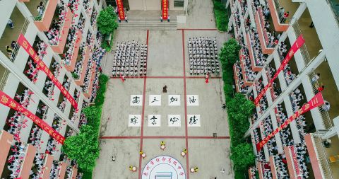 High school students in Huizhou shout words of encouragement on June 5, 2019, ahead of the college entrance exam.
