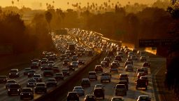 Heavy traffic clogs the 101 Freeway as people leave work for the Labor Day holiday in Los Angeles on August 29, 2014.  A Labor Day travel prediction by the American Auto Association (AAA) expects that 34.7 million Americans will journey 50 miles or more from home during the Labor Day holiday weekend, mainly due to lower gas prices and a rebounding economy.             AFP PHOTO/Mark RALSTON        (Photo credit should read MARK RALSTON/AFP/Getty Images)