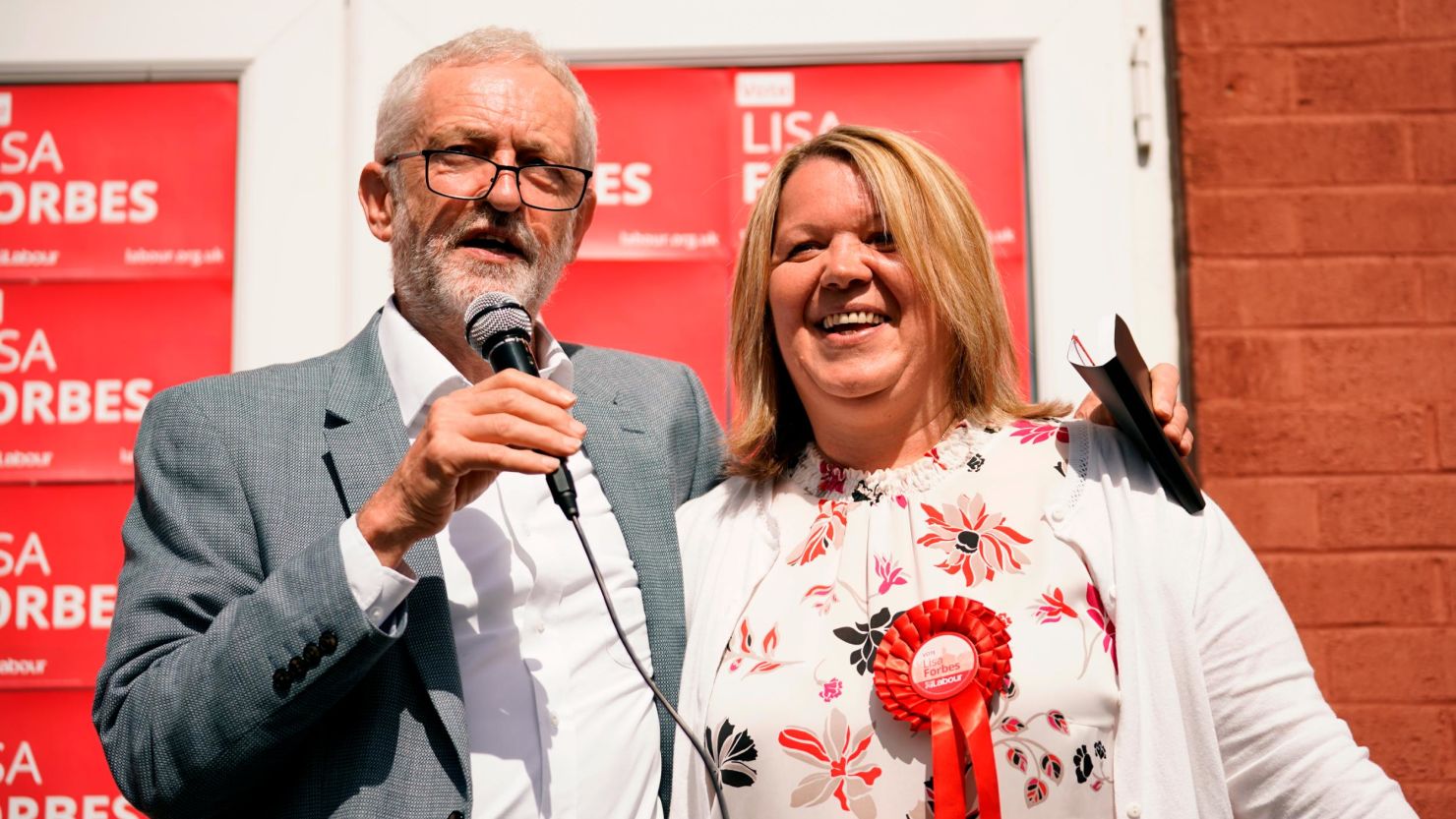 British Labour Party leader Jeremy Corbyn and the party's prospective parliamentary candidate Lisa Forbes talk to supporters in the run up to the Peterborough by-election on June 1, 2019 in Peterborough, England. 