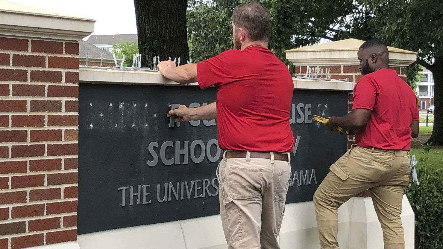 The name of Hugh F. Culverhouse Jr. was removed off a sign in the University of Alabama's School of Law on Friday. 