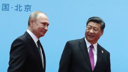 TOPSHOT - China's President Xi Jinping (R) and Russia's President Vladimir Putin smile during the welcoming ceremony on the final day of the Belt and Road Forum in Beijing on April 27, 2019. - Chinese President Xi Jinping urged dozens of world leaders on April 27 to reject protectionism and invited more countries to participate in his global infrastructure project after seeking to ease concerns surrounding the programme. (Photo by Valeriy Sharifulin / Sputnik / AFP)        (Photo credit should read VALERIY SHARIFULIN/AFP/Getty Images)