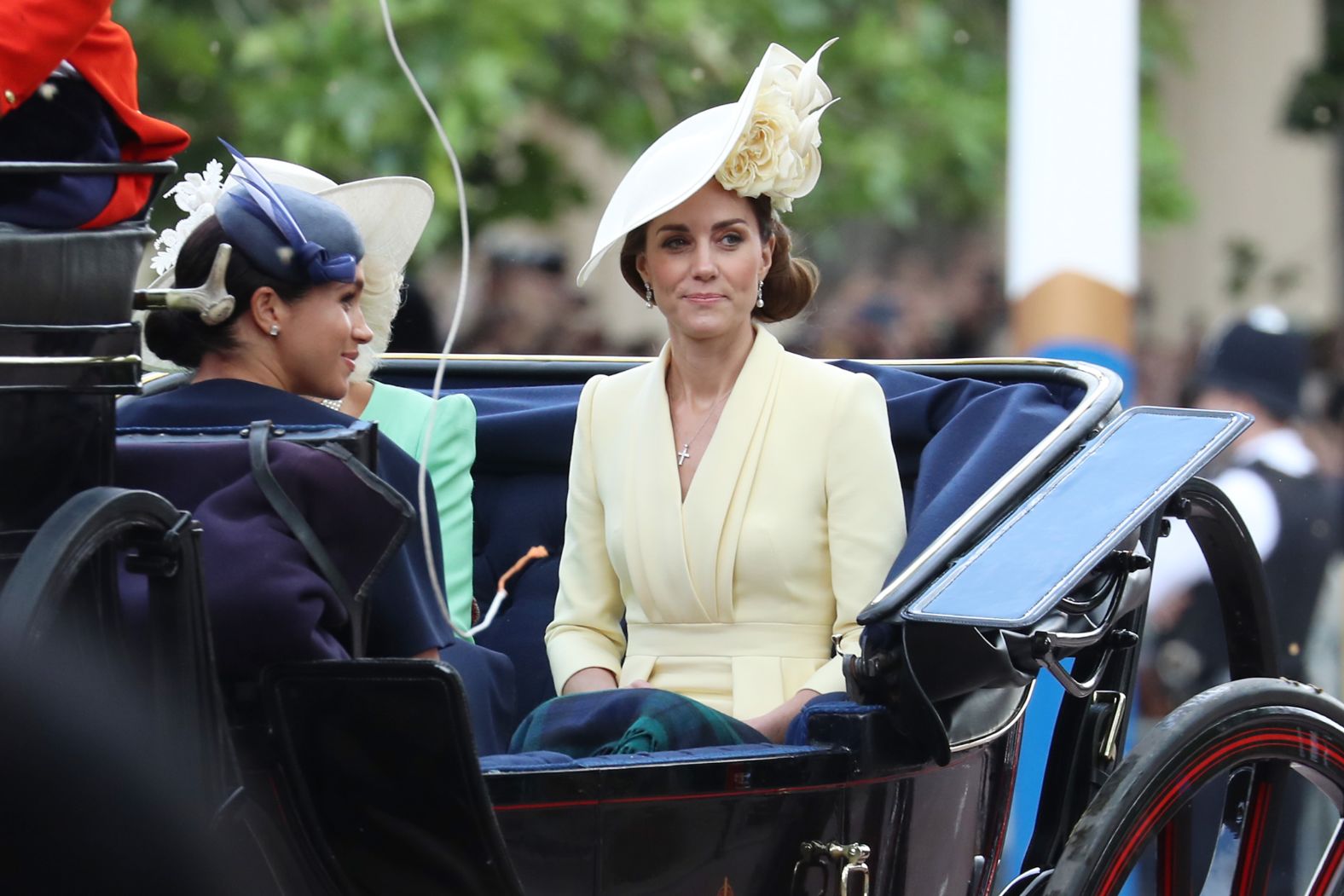 Meghan, the Duchess of Sussex, makes her first appearance in a public engagement since her son's birth, riding with Catherine, the Duchess of Cambridge.