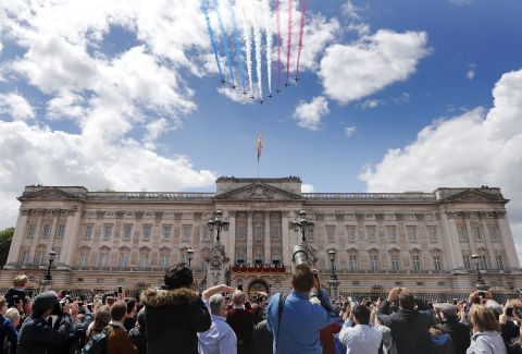 Airplanes fly over Buckingham Palace in London during Trooping the Colour on Saturday, June 8. The annual parade marks the official birthday celebration of Britain's Queen Elizabeth II.