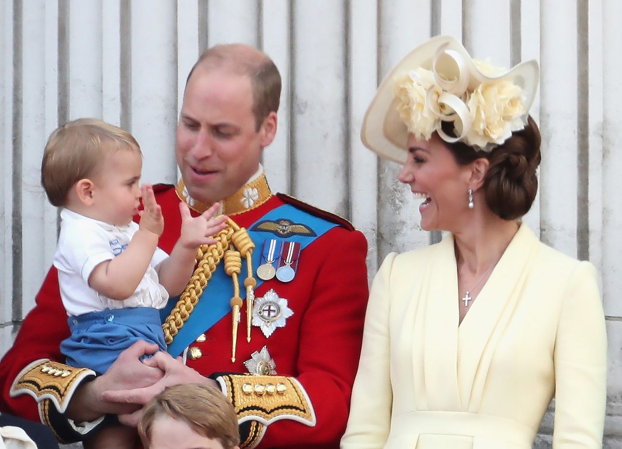 Prince William and Catherine share a laugh with their youngest child, Prince Louis, during the celebration.