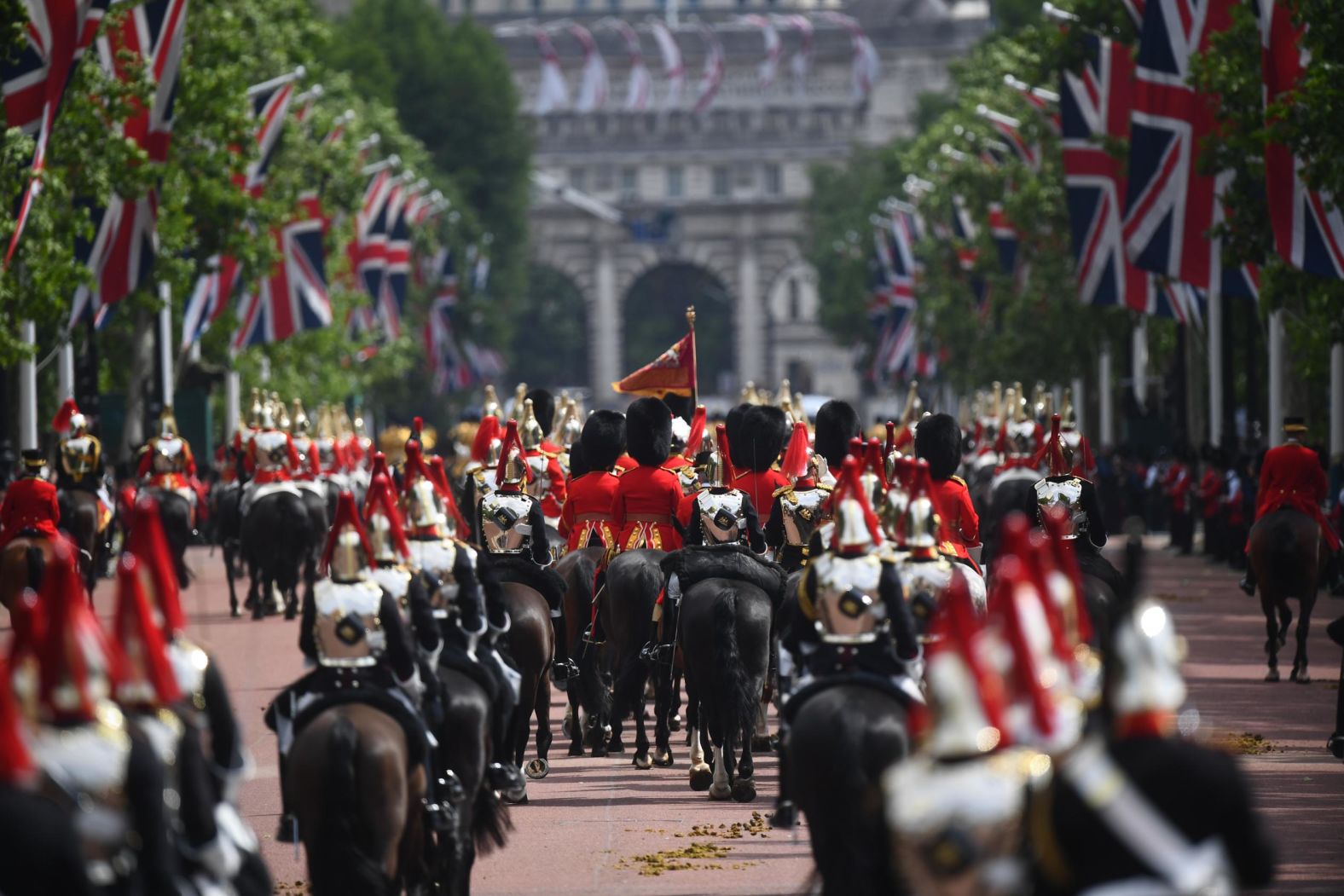 Soldiers make their way from Buckingham Palace to Horse Guards Parade in London ahead of Trooping the Colour.