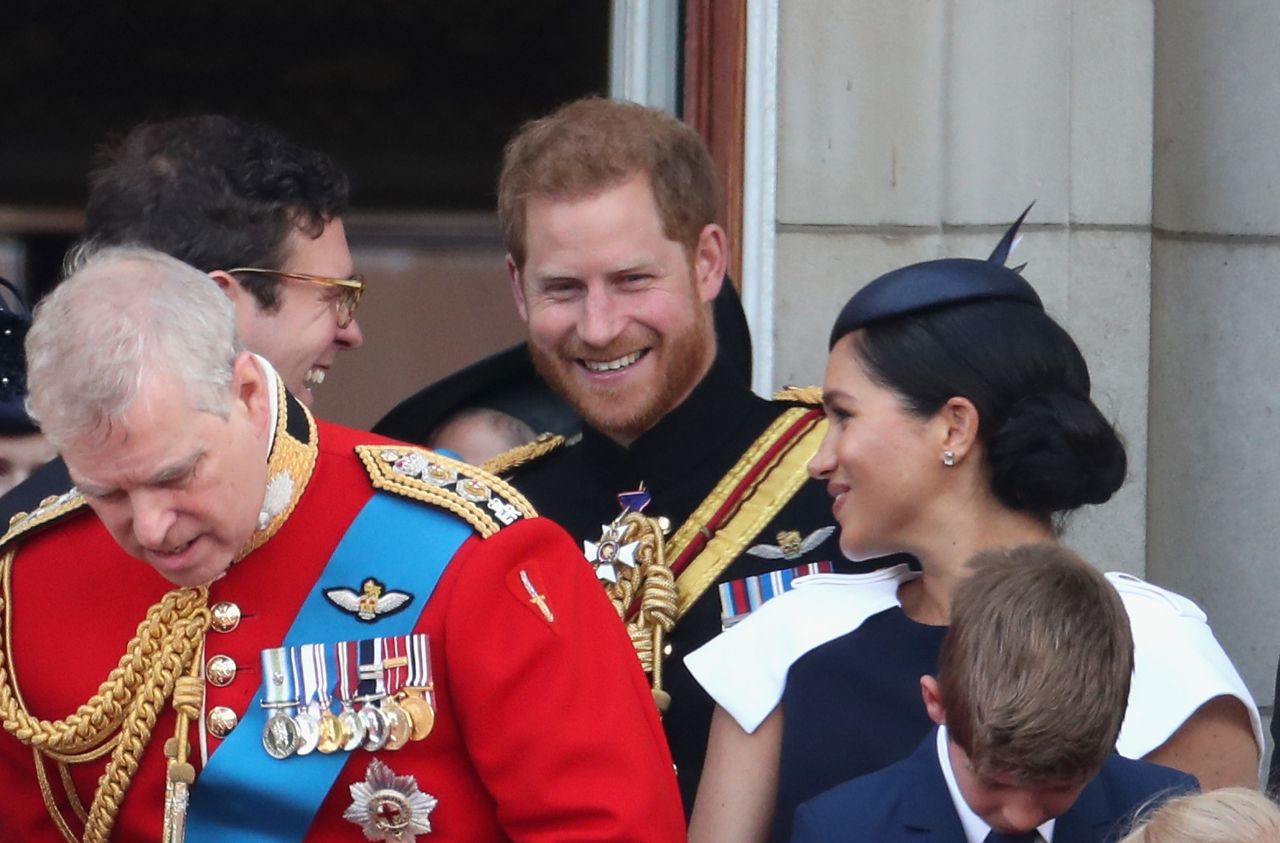 Prince Harry and Meghan chat with Jack Brooksbank, the husband of  Princess Eugenie, during Trooping the Colour.