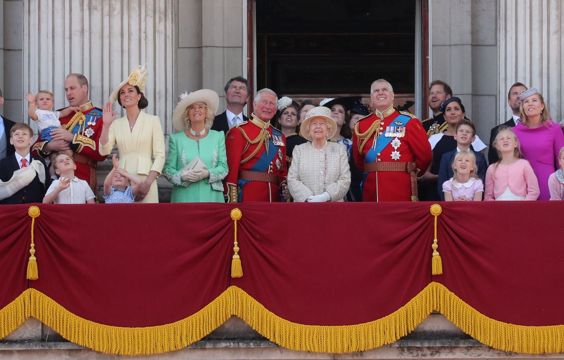 Members of the British royal family watch last year's Trooping the Colour ceremony -- marking the Queen's official birthday -- from the balcony of Buckingham Palace on June 8, 2019.