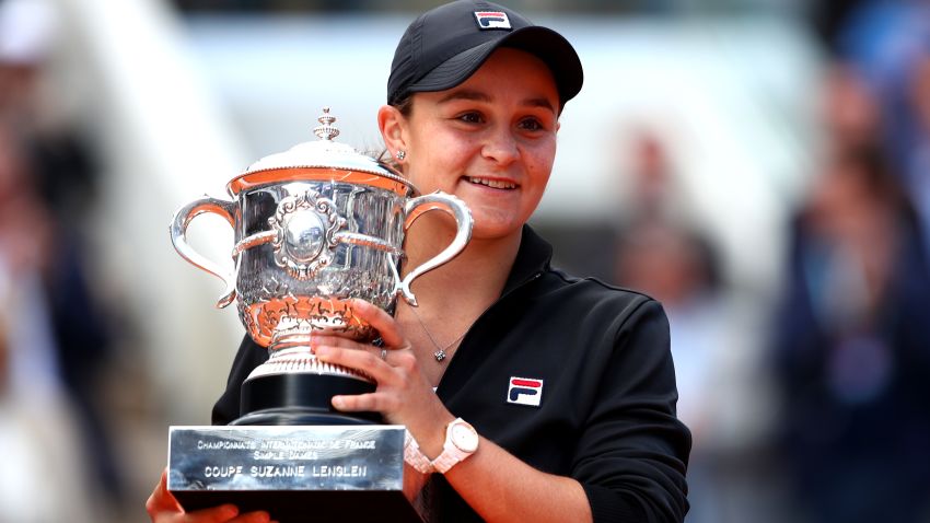 PARIS, FRANCE - JUNE 08: Ashleigh Barty of Australia celebrates victory with the trophy following the ladies singles final against Marketa Vondrousova of The Czech Republic during Day fourteen of the 2019 French Open at Roland Garros on June 08, 2019 in Paris, France. (Photo by Clive Brunskill/Getty Images)