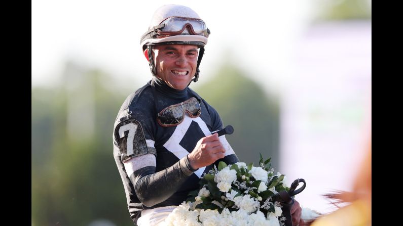 Jockey Joel Rosario celebrates after winning the Belmont Stakes on Saturday.