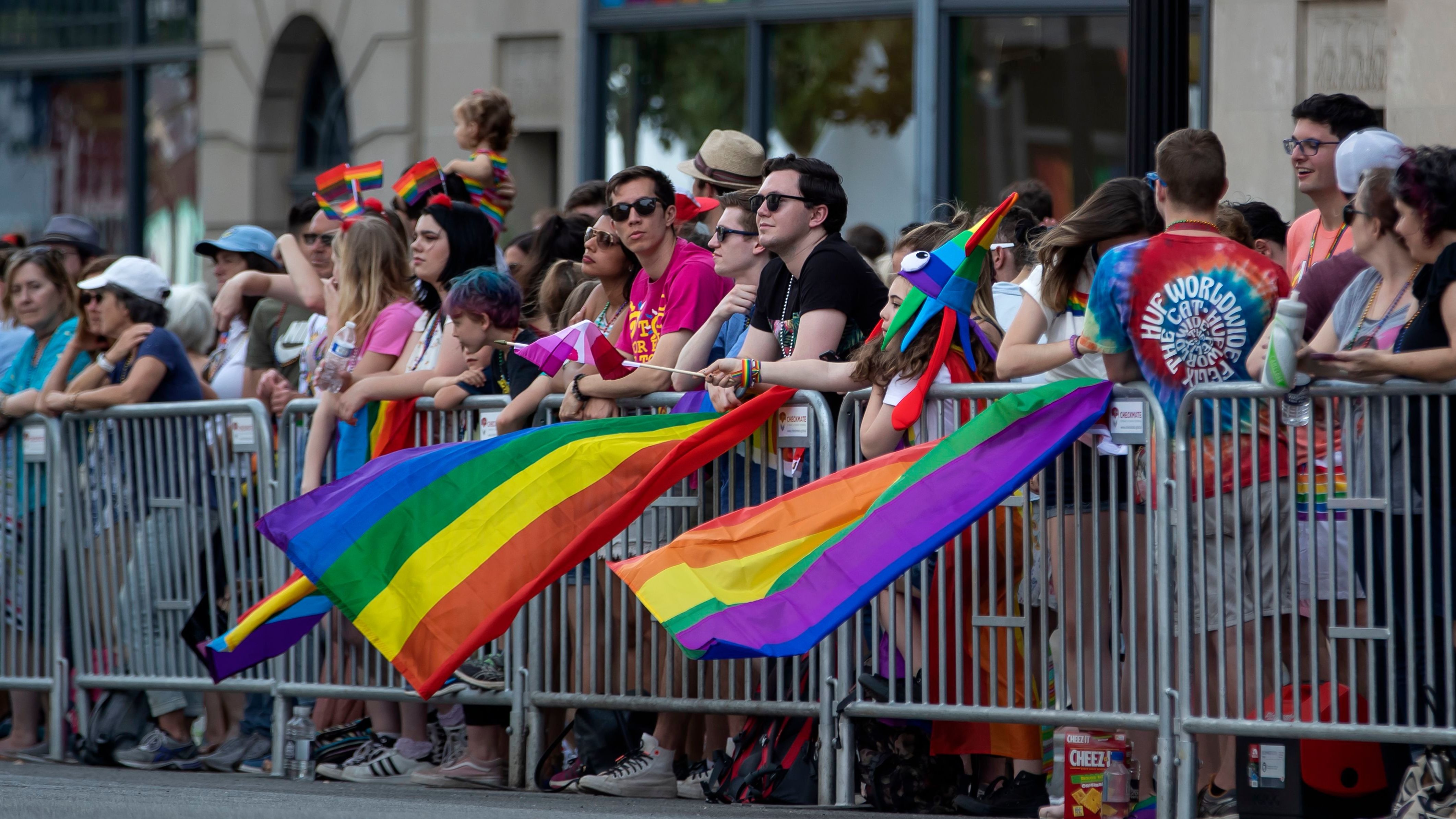 People watch the Capital Pride Parade in Washington on Saturday.