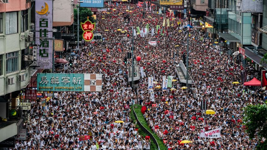 HONG KONG, HONG KONG - JUNE 09:  Protesters march on a street during a rally against the extradition law proposal on June 9, 2019 in Hong Kong China. Hundreds of thousands of protesters marched in Hong Kong in Sunday against a controversial extradition bill that would allow suspected criminals to be sent to mainland China for trial.(Photo by Anthony Kwan/Getty Images)