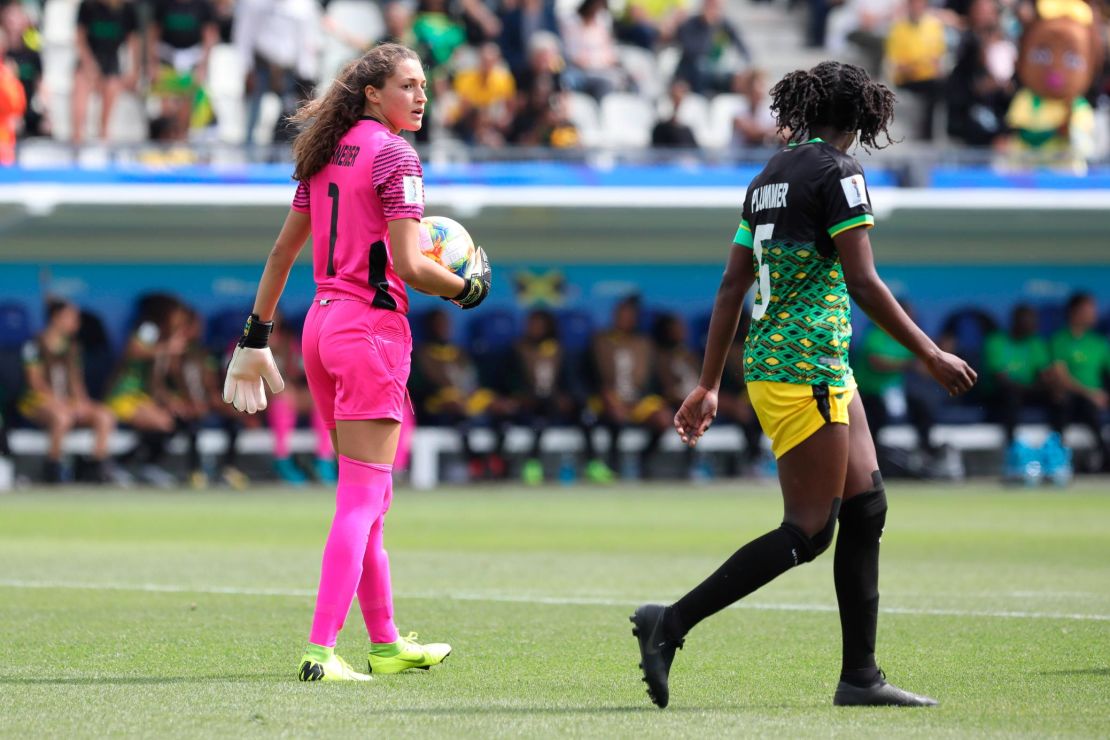 Jamaica goalkeeper Sydney Schneider, left, holds the ball during the Women's World Cup Group C soccer match between Brazil and Jamaica on Sunday.