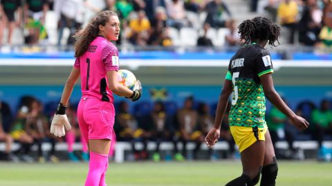 Jamaica goalkeeper Sydney Schneider, left, holds the ball during the Women's World Cup Group C soccer match between Brazil and Jamaica on Sunday.