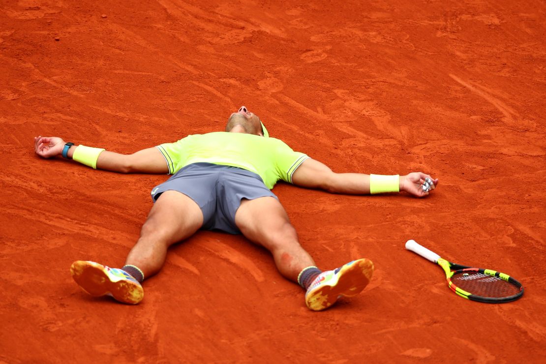 Rafael Nadal sunk to the clay after beating Dominic Thiem to win the French Open. 