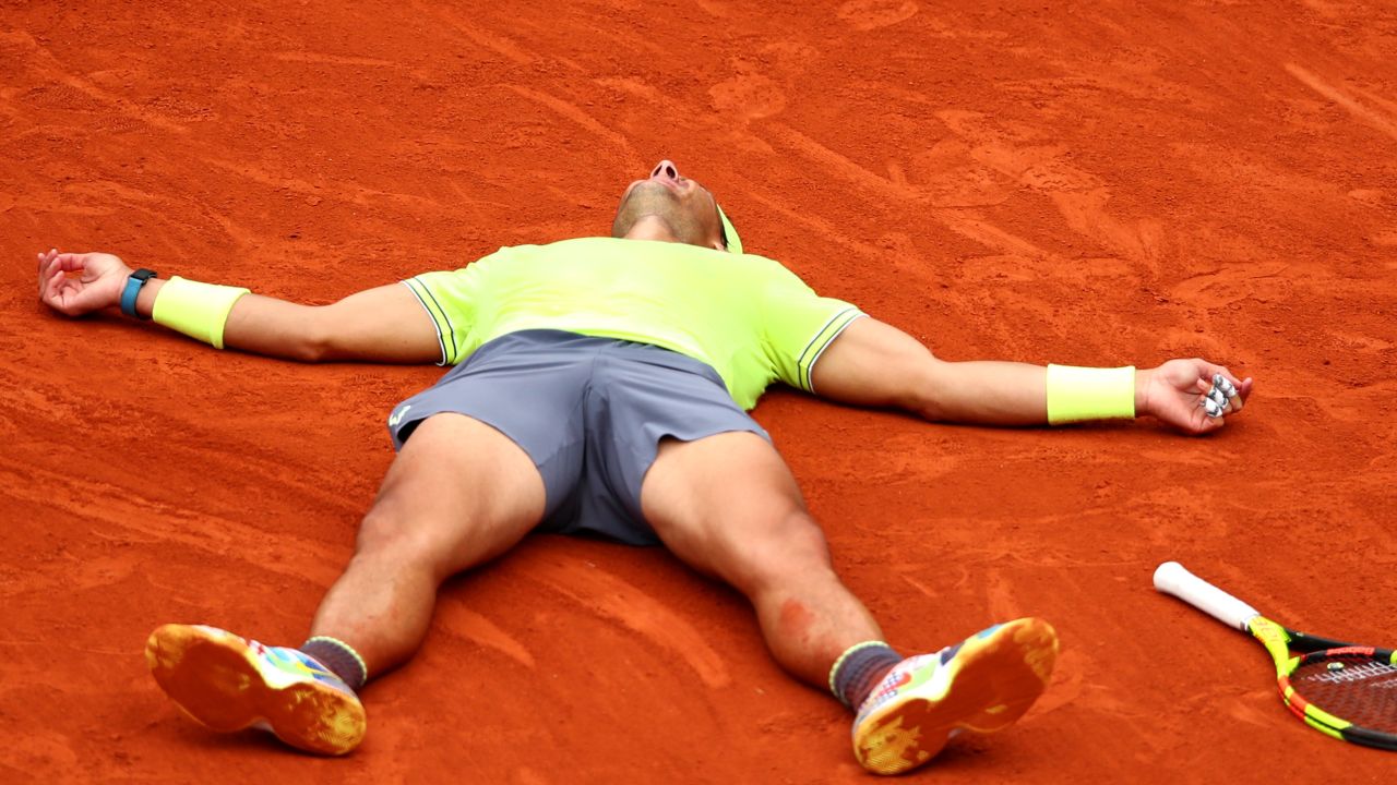 Rafael Nadal sunk to the clay after beating Dominic Thiem to win the French Open. 