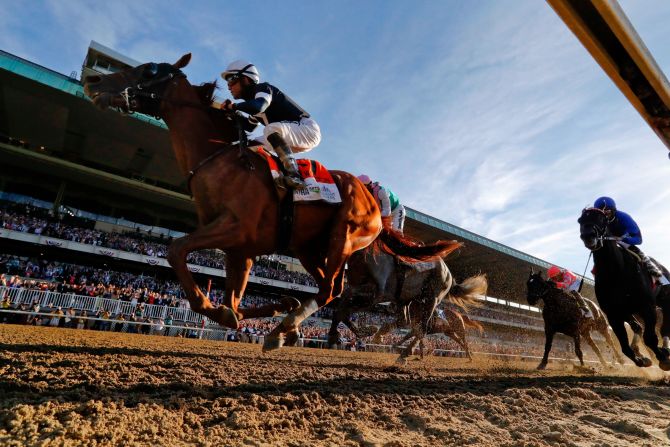 Sir Winston (7), with jockey Joel Rosario up, crosses the finish line to win the 151st running of the Belmont Stakes horse race, Saturday, June 8, 2019, in Elmont, New York.
