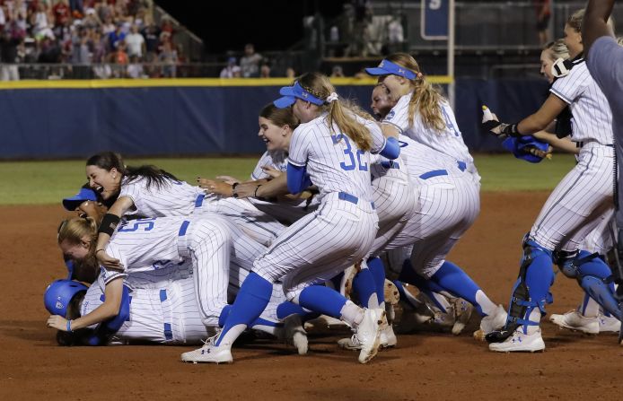 UCLA players celebrate after defeating Oklahoma in the NCAA softball Women's College World Series in Oklahoma City, Tuesday, June 4, 2019. UCLA won 5-4 in Game 2, taking both games in the best-of-three series.