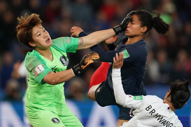 South Korea's goalkeeper Min-Jeong Kim, left, vies with France's forward Valerie Gauvin during the France 2019 Women's World Cup Group A football match between France and South Korea, on June 7, 2019, at the Parc des Princes stadium, in Paris.