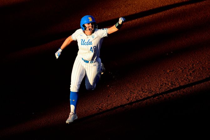 Bubba Nickles of the UCLA Bruins celebrates after hitting a home run against the Oklahoma Sooners during the Division I Women's Softball Championship held at ASA Hall of Fame Stadium-OGE Energy Field on June 4, 2019 in Oklahoma City, Oklahoma.