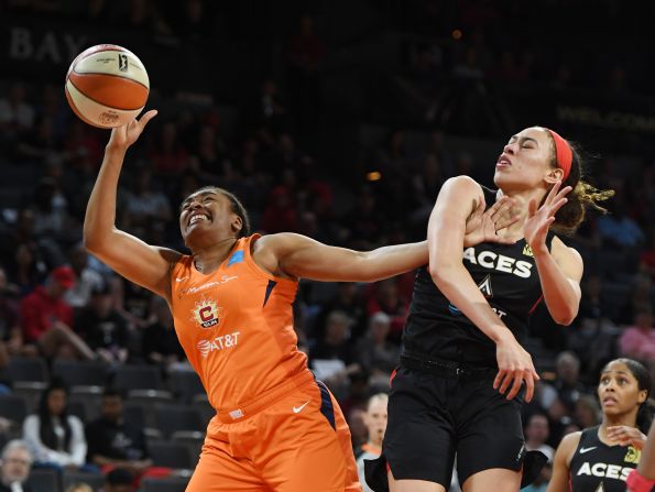 Dearica Hamby #5 of the Las Vegas Aces blocks a shot by Morgan Tuck #33 of the Connecticut Sun during their game at the Mandalay Bay Events Center on June 2, 2019 in Las Vegas, Nevada.