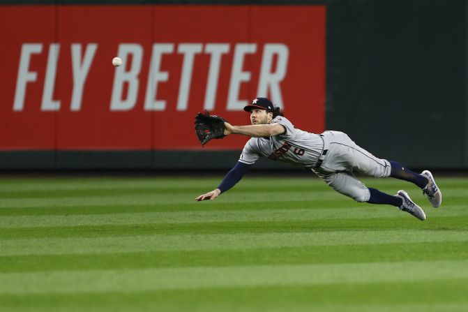 Houston Astros center fielder Jake Marisnick makes a diving catch against the Seattle Mariners eighth inning at T-Mobile Park.