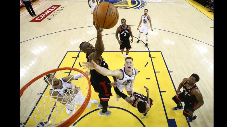 Jonas Jerebko of the Golden State Warriors attempts a shot against Serge Ibaka of the Toronto Raptors in the second half during Game Three of the 2019 NBA Finals at ORACLE Arena on June 5, 2019 in Oakland.