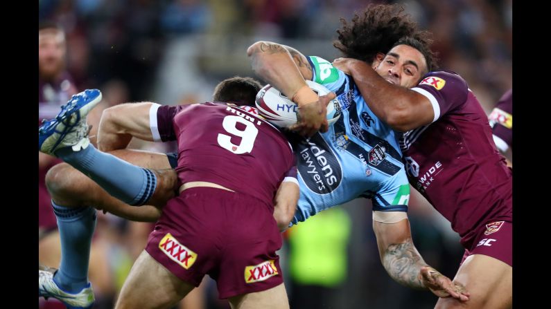 Paul Vaughan of the Blues is tackled during game one of the 2019 State of Origin series between the Queensland Maroons and the New South Wales Blues at Suncorp Stadium on June 5, 2019 in Brisbane, Australia.