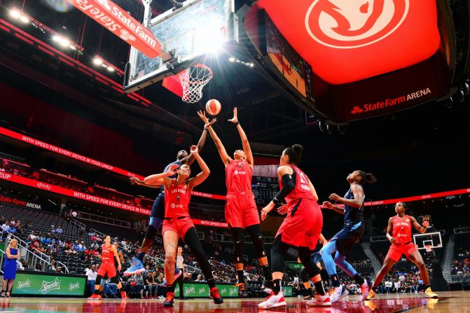 Liz Cambage #8 of the Las Vegas Aces rebounds the ball against the Atlanta Dream on June 6, 2019, at State Farm Arena in Atlanta, Georgia.
