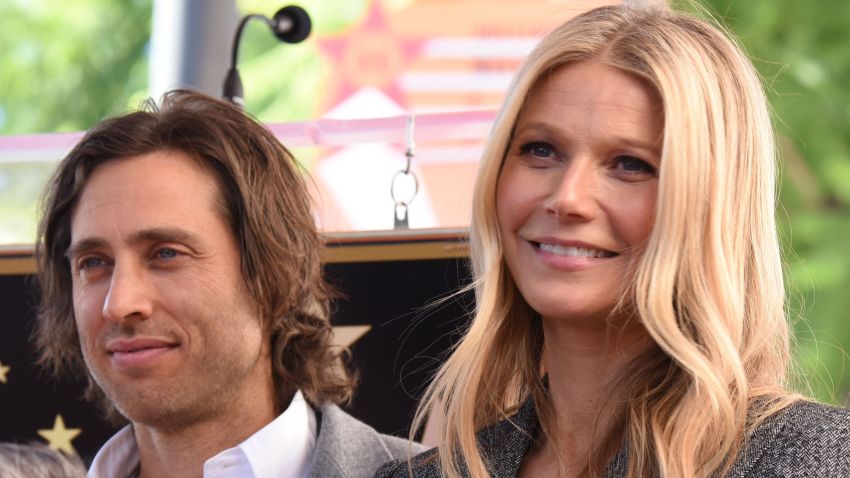 Actor Gwyneth Paltrow (R) and producer Brad Falchuk (L) attend the Hollywood Walk of Fame star unveiling ceremony for producer/director Ryan Murphy, December 4, 2018 in Hollywood, California.