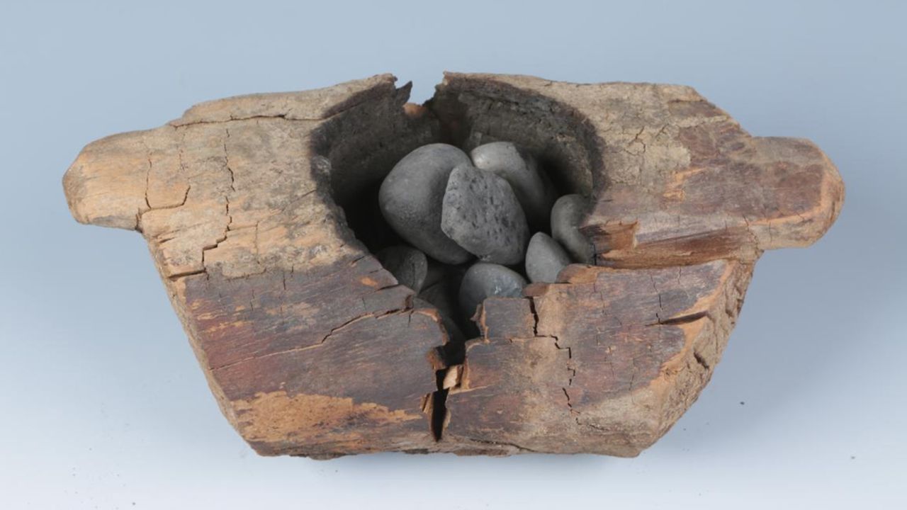 The brazier and burnt stones.