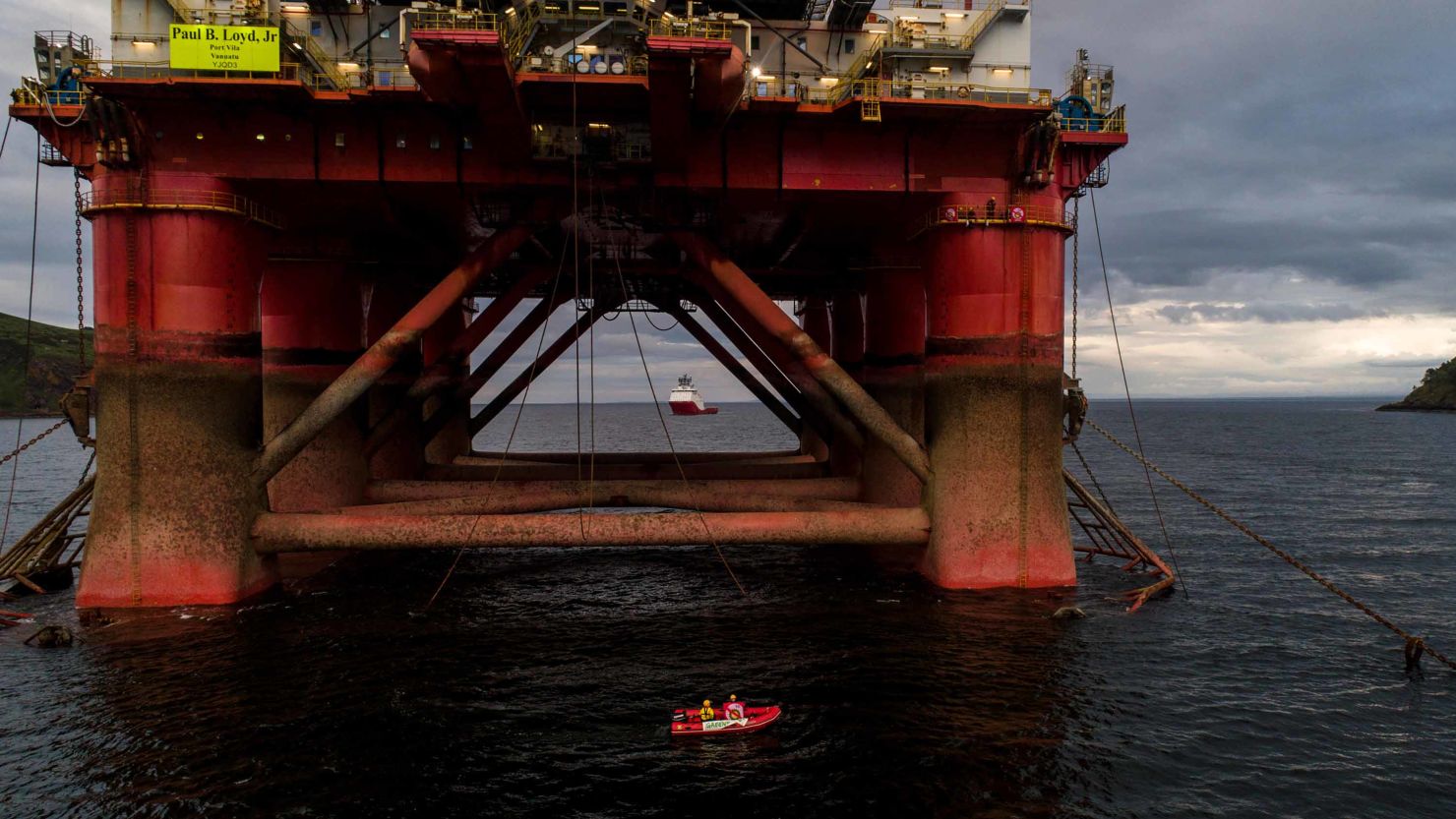 A Greenpeace boat pictured beneath the oil rig bound for the North Sea on Sunday. 