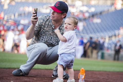 Swallwell and his son, Nelson, attend the Congressional Baseball Game in June 2018. Swalwell has two children with his wife, Brittany.