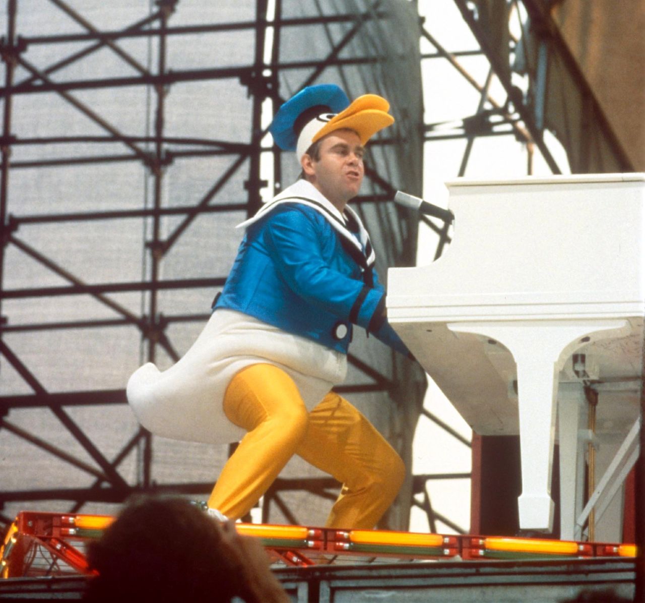 Elton John wears Bob Mackie during a performance in New York's Central Park in 1980.