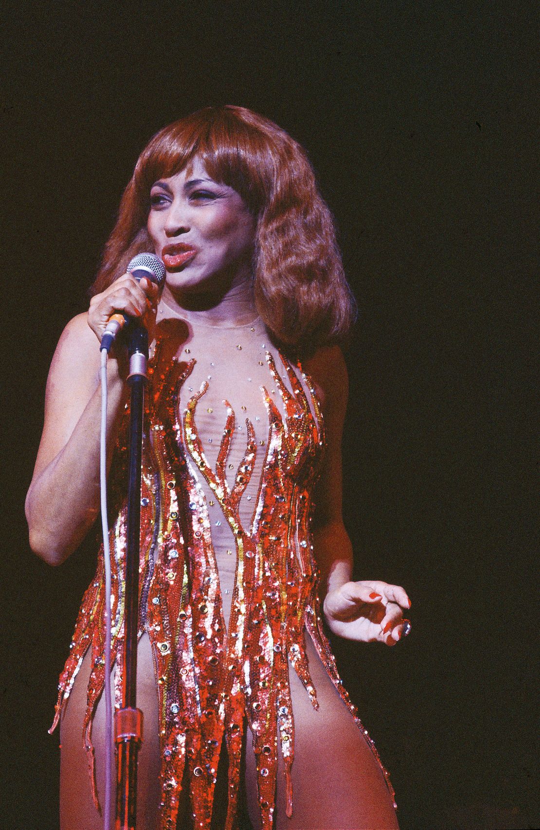 Tina Turner performs in a sequined Bob Mackie dress in the late 1970s.