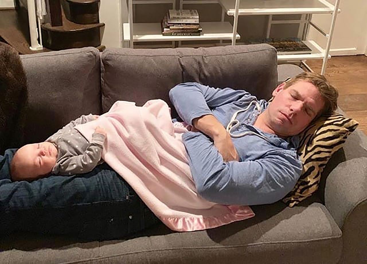 Swalwell sleeps with his young daughter, Kathryn.