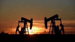 FILE PHOTO: Pump jacks operate at sunset in an oil field in Midland, Texas U.S. August 22, 2018. Picture taken August 22, 2018. REUTERS/Nick Oxford/File Photo