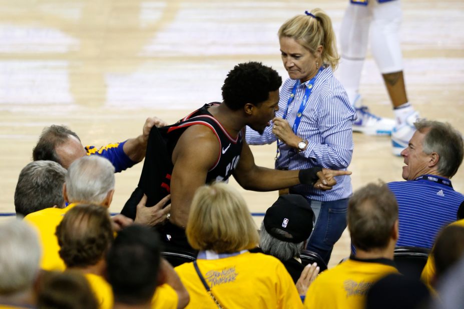 Lowry argues with Mark Stevens, a Warriors investor who pushed him in Game 3 after Lowry jumped into the seats for a loose ball.