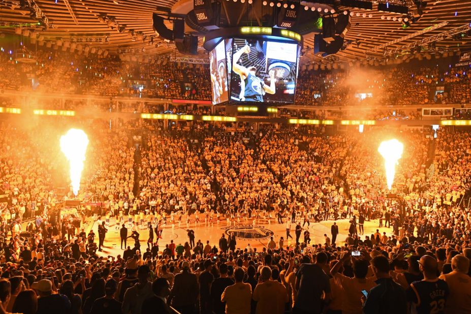 Warriors fans get ready for Game 3 at Oracle Arena. Next season, the team moves into a new arena in San Francisco.