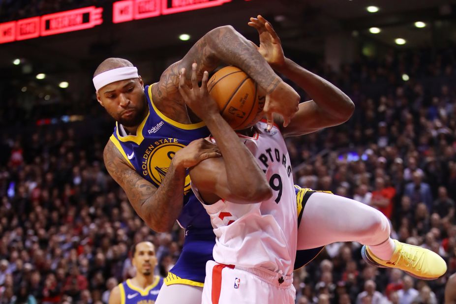 Cousins tries to block an Ibaka shot during Game 1.