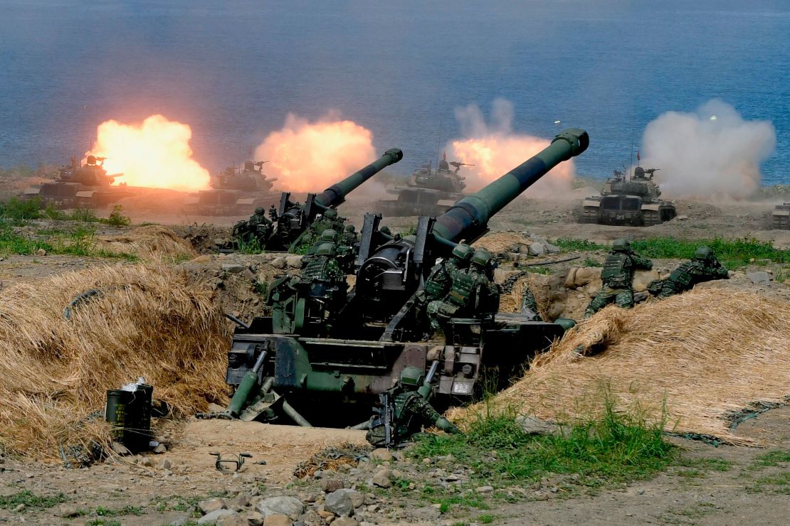 US-made CM-11 tanks are fired in front of two 8-inch self-propelled artillery guns during military drills in southern Taiwan on May 30.
