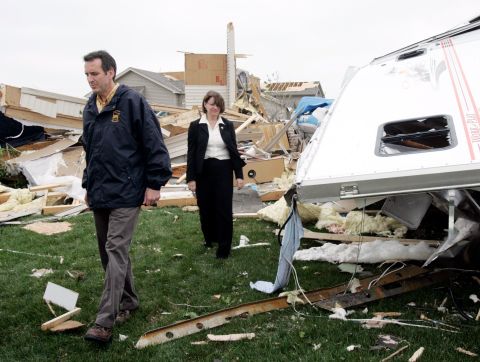 Klobuchar and Minnesota Gov. Tim Pawlenty survey homes that were destroyed by a storm in Hugo, Minnesota, in May 2008.