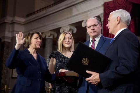 Klobuchar is joined by her husband and daughter as Vice President Mike Pence administers the Senate oath of office in January 2019. Klobuchar was just starting her third term in office.
