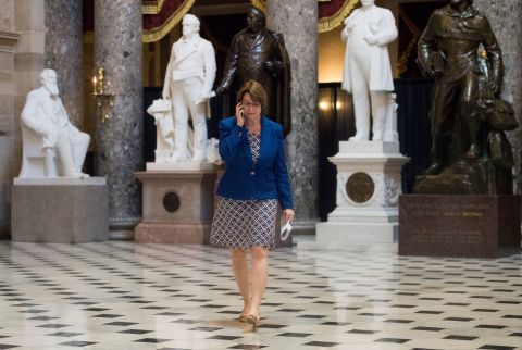 Klobuchar walks through Statuary Hall on her way back to the Senate following a joint meeting of Congress in April 2015.