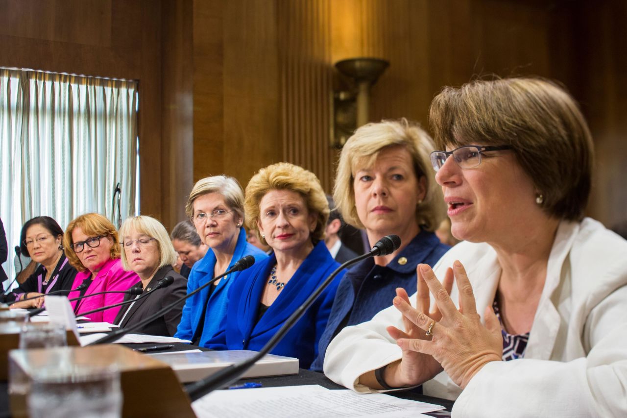 Klobuchar, right, is joined by other female senators as she testifies during a Senate subcommittee hearing about violence and discrimination against women.