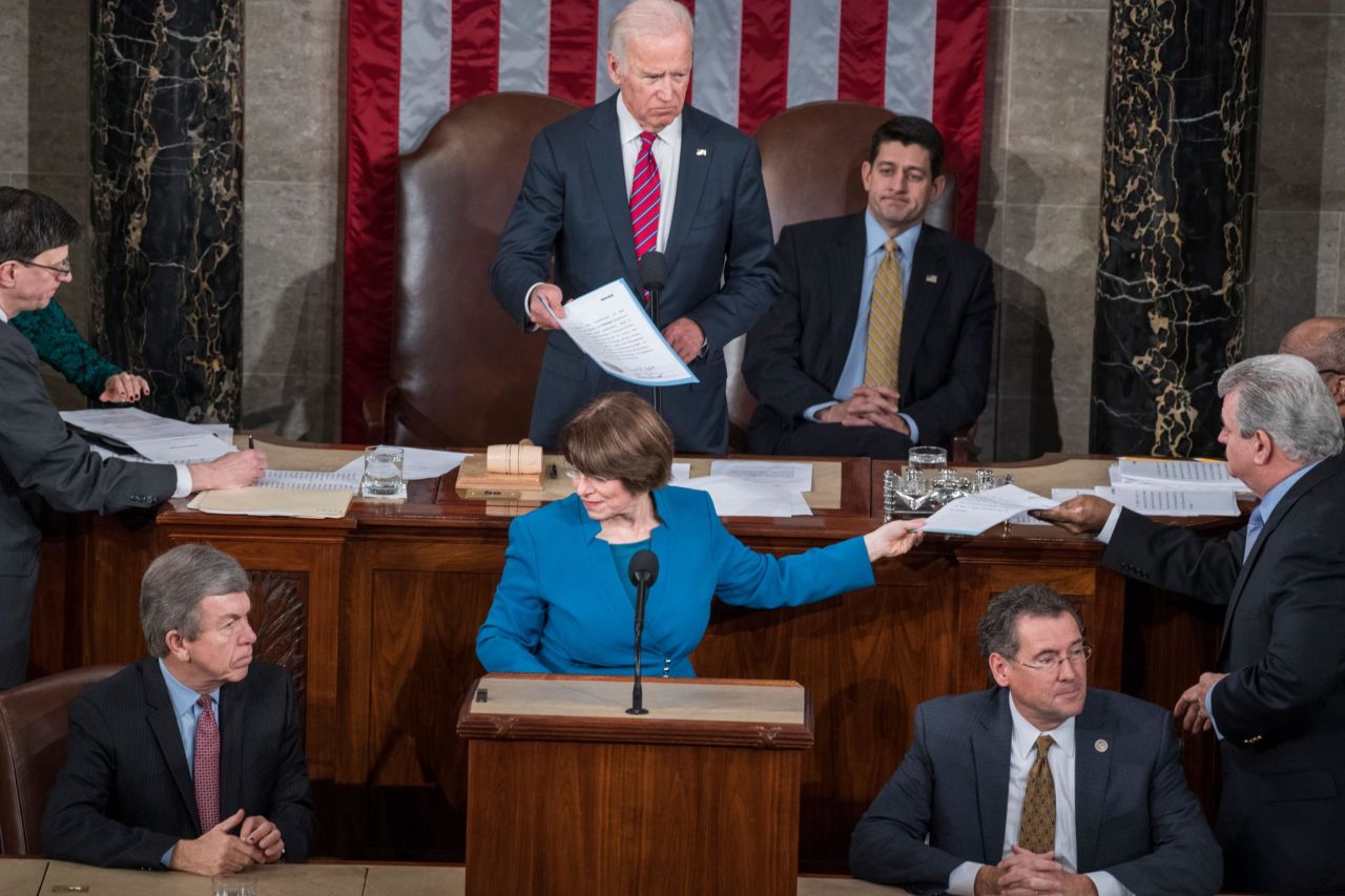Klobuchar helps count Electoral College votes during a joint session of Congress in January 2016.