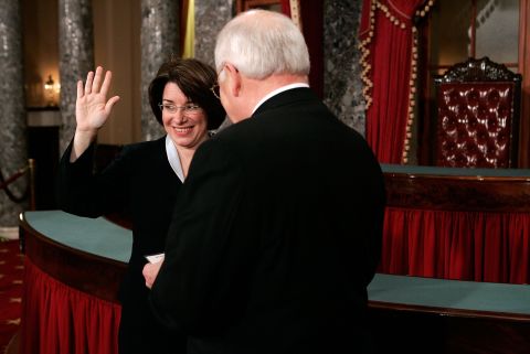 Klobuchar participates in a ceremonial swearing-in with Vice President Dick Cheney in January 2007.