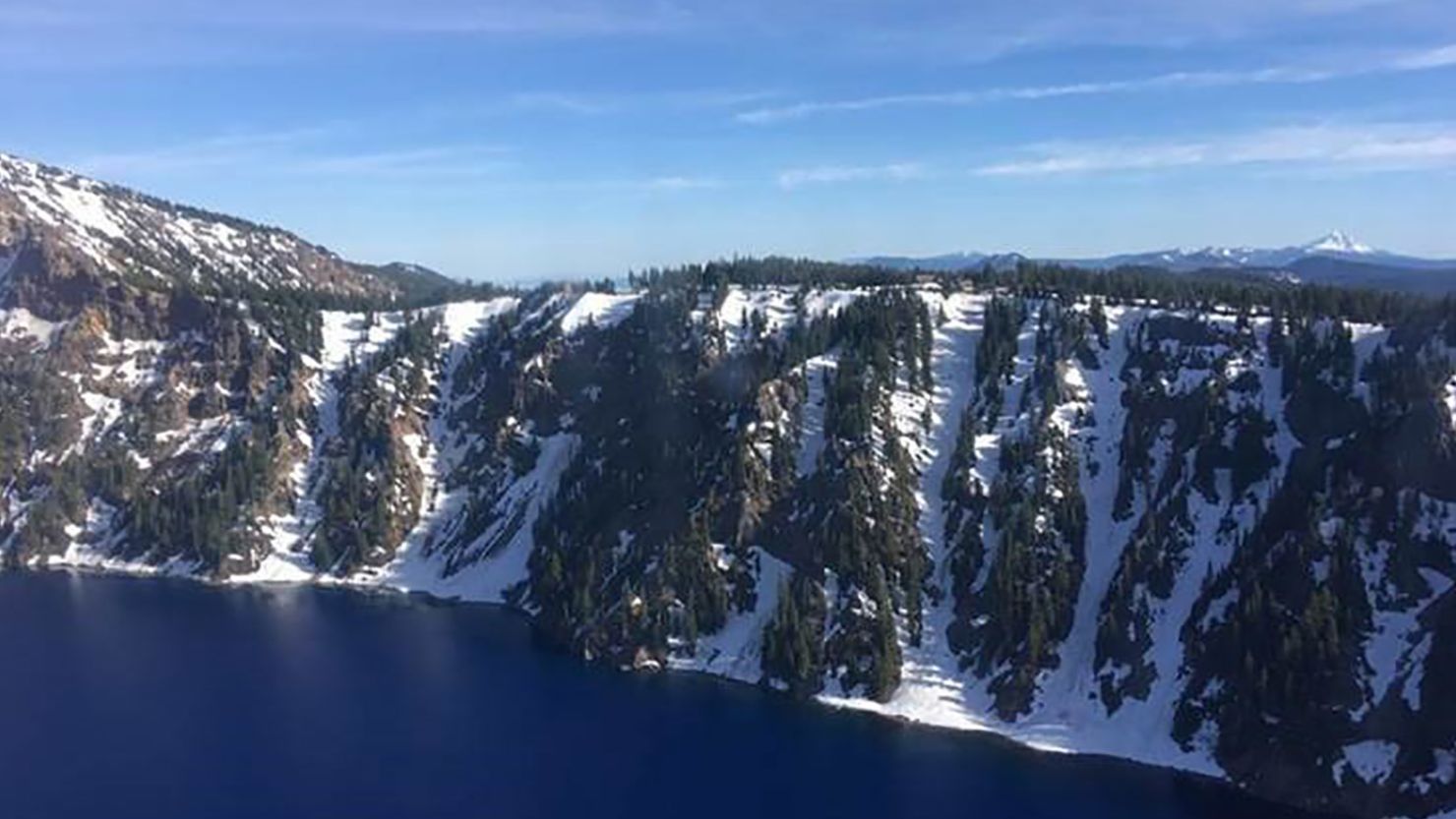 The Coast Guard rescued a man who fell into the Crater Lake caldera in Oregon on Monday afternoon.